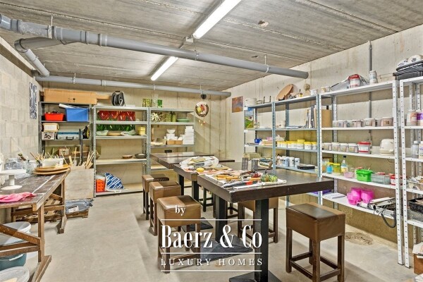 photo 34 Uitzonderlijke Duplex met zicht op kanaal, garage, carport en ruime (wijn)kelder!